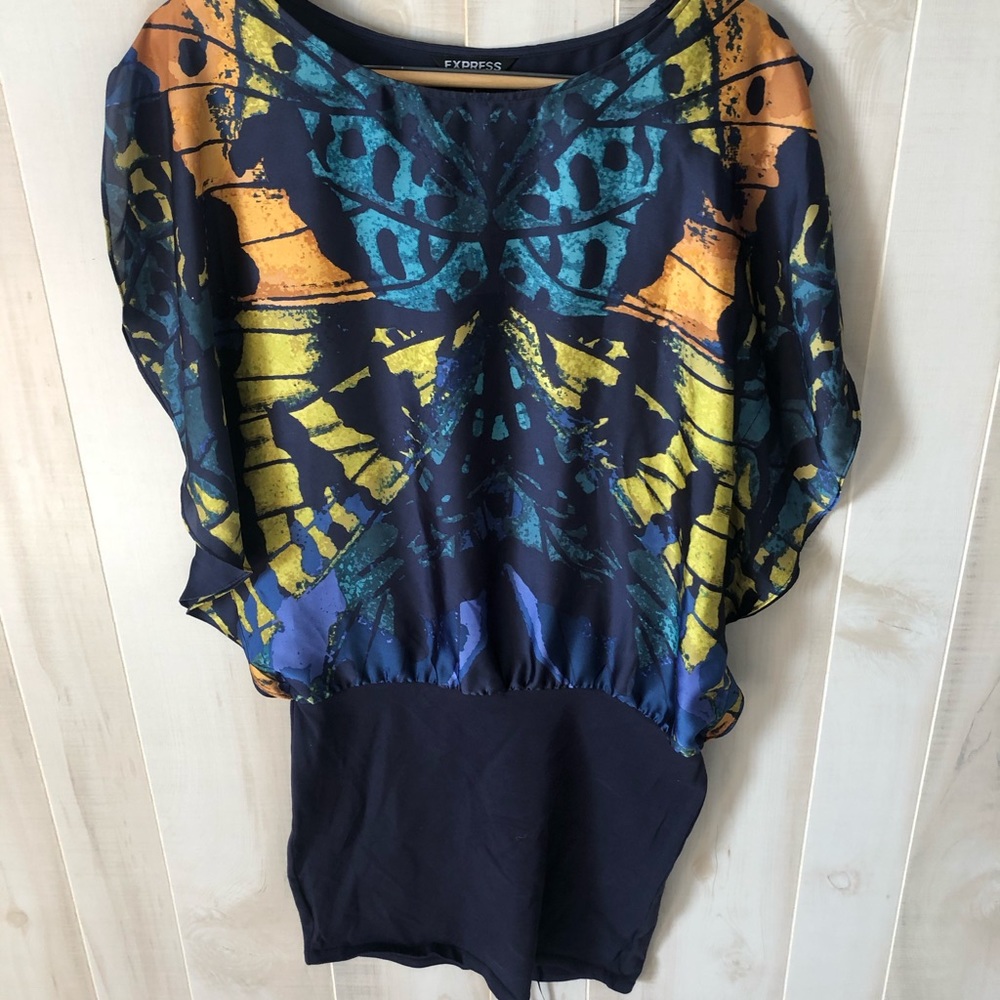 Mini dressed, flowing top, hip fitted